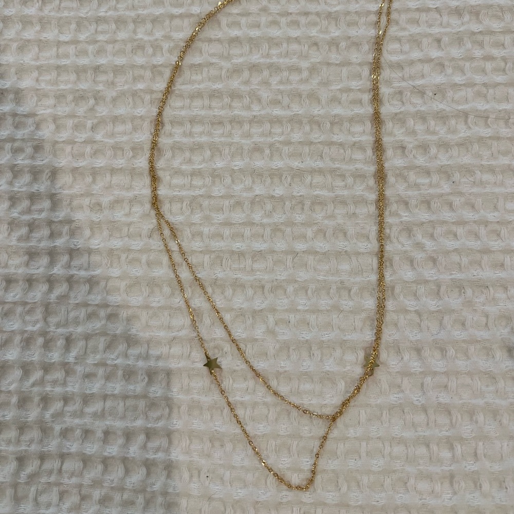 Gold necklace with stars